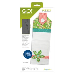 AccuQuilt GO Towel Topper Die 55641 showing floral, modern blue, and seasonal mitten themed hanging kitchen towels with button closures