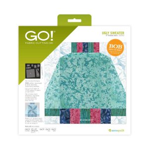 AccuQuilt GO! Ugly Sweater Die showing die board shape layout and finished quilt block example