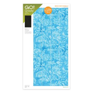 AccuQuilt GO Grizzly Strip Cutter 2.5 inch die board cutting four strips with angled grid lines