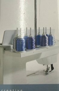 Pfaff creative Eight Spool Thread Rack attachment mounted on sewing machine